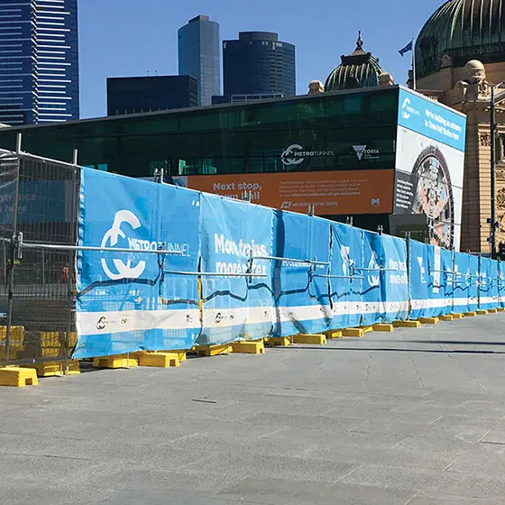 1300TempFence-temporary-fencing-with-custom-printed-mesh-banners-at-Flinders-Street-Station-in-Melbourne,-Victoria